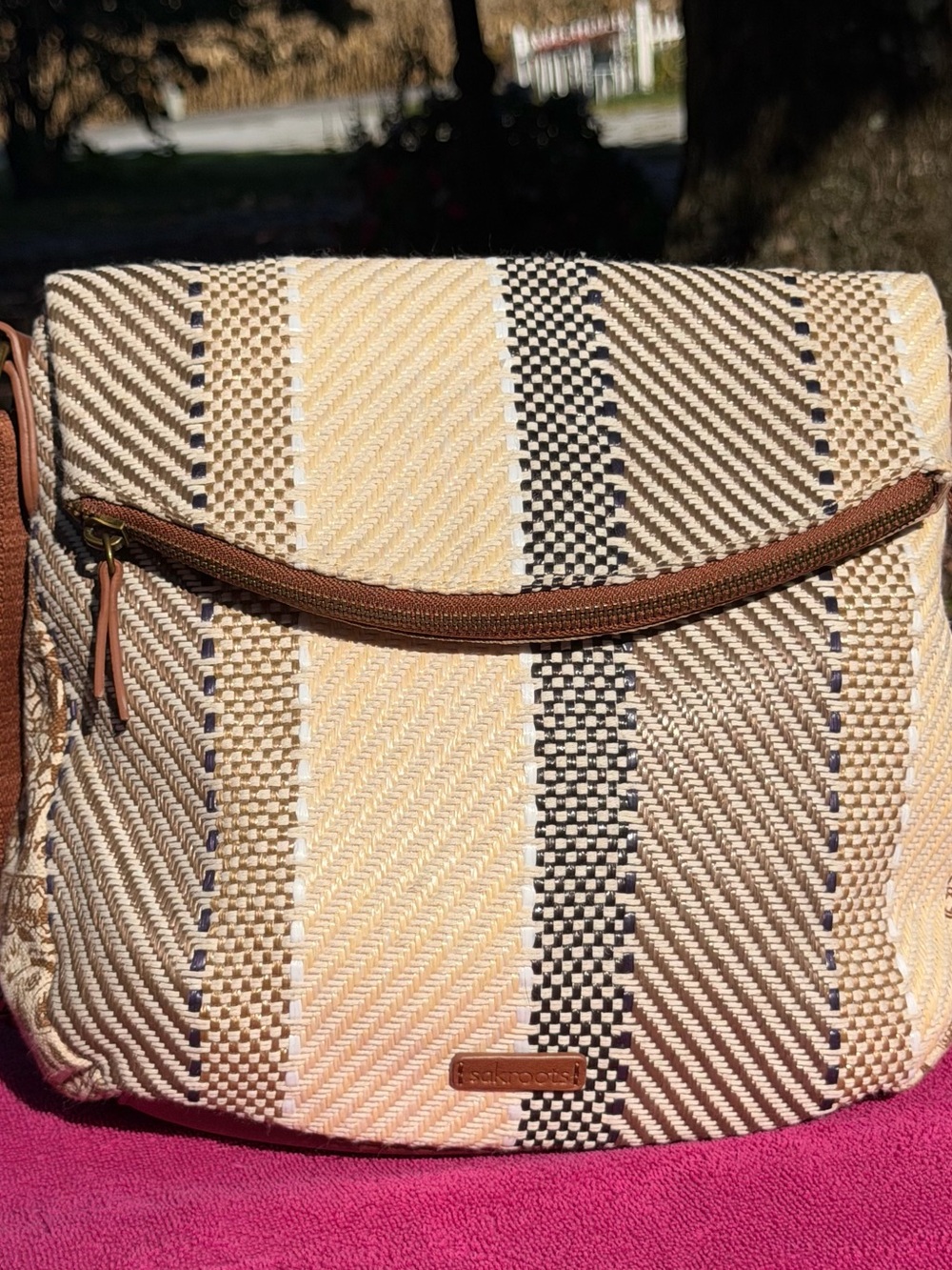 Sakroots Woven Stripe Crossbody Bag in Cream Tan Black and Blue